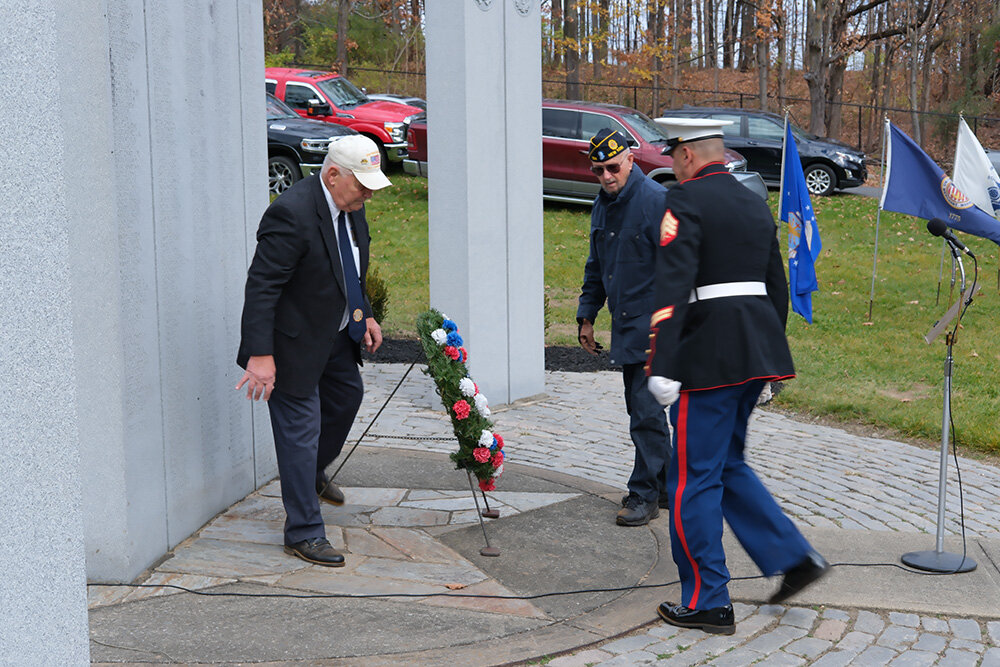 The ceremonial wreath was placed at the memorial by L-R Legion Commander Tom Schroeder, Jack Gallagher and Eric Simmons